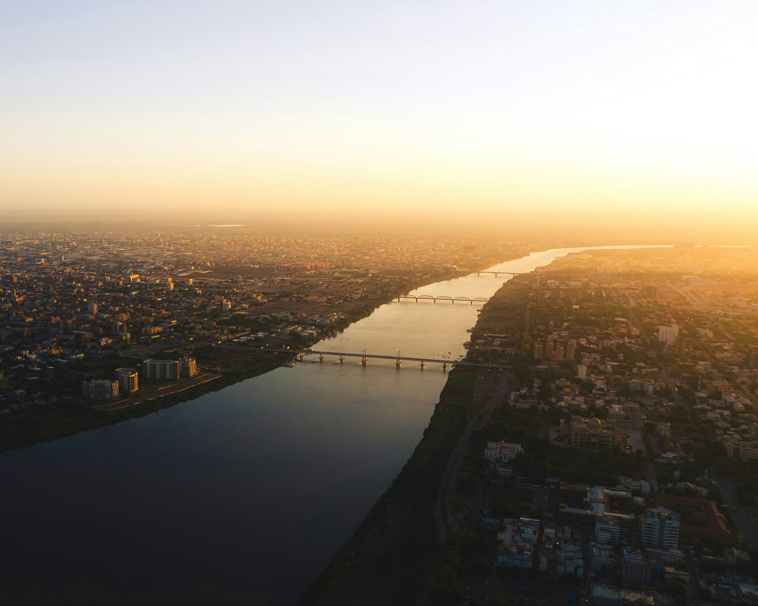 aerial view of city aerial view of city buildings during sunset